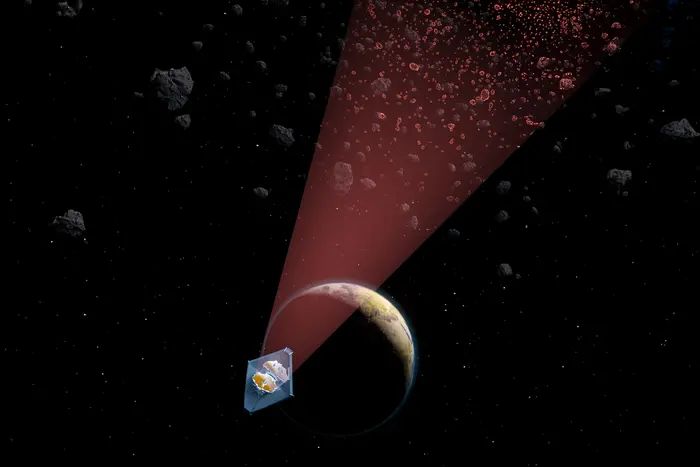 An artists illustration of NASAs James Webb Space Telescope revealing a population of small asteroids in the main asteroid belt Credit Ella Maru