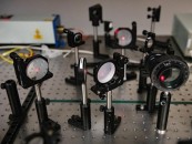 A series of mirrors and prisms deflect lasers and focus them to perform the reaction CREDIT The University of Texas at Austin